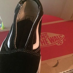 Women Black  / White Vans sizes 7.5 used
